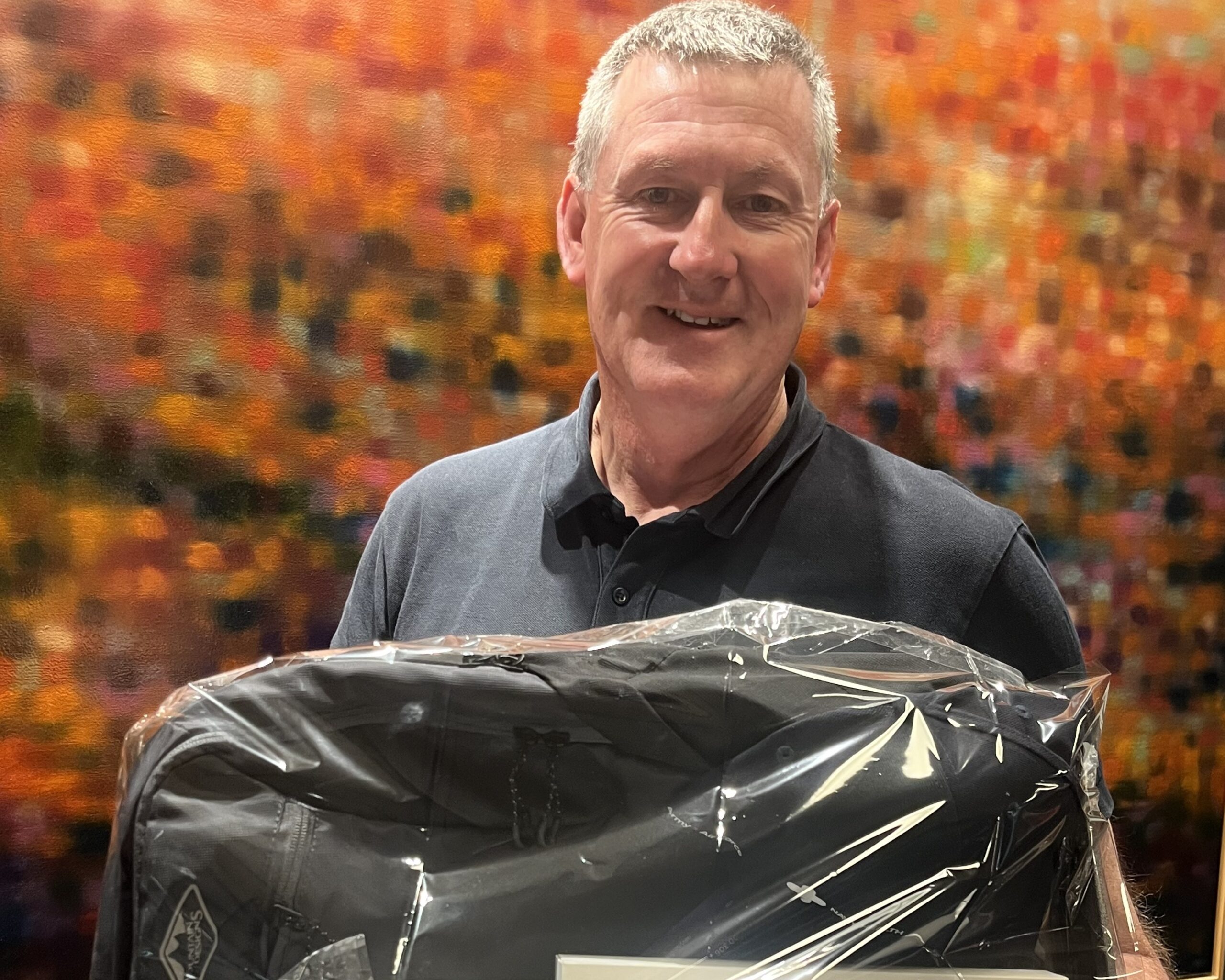 David Davine holding his Navy Health Avalon Prize
