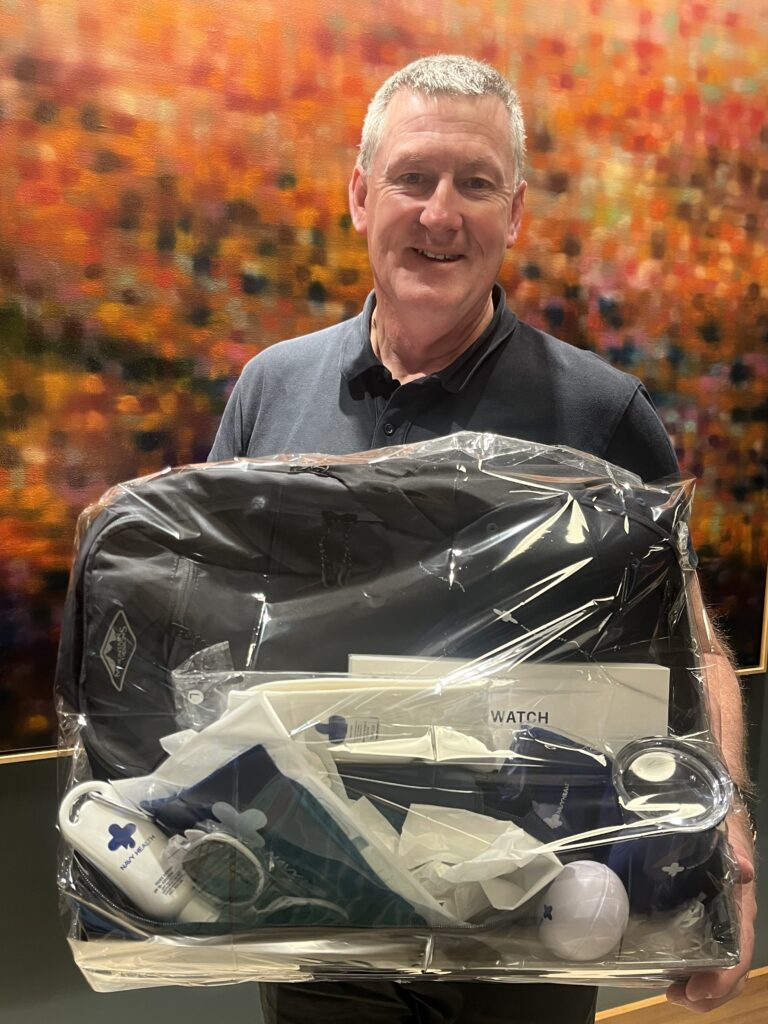David Davine holding his Navy Health Avalon Prize
